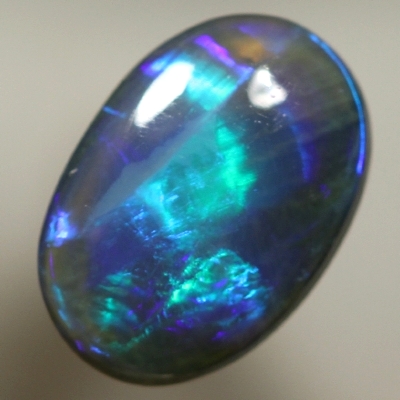 14k Yellow Gold Ring with a SOLID BLACK OPAL RARE Ribbon pattern. Peacock fire. SEE VIDEO 
